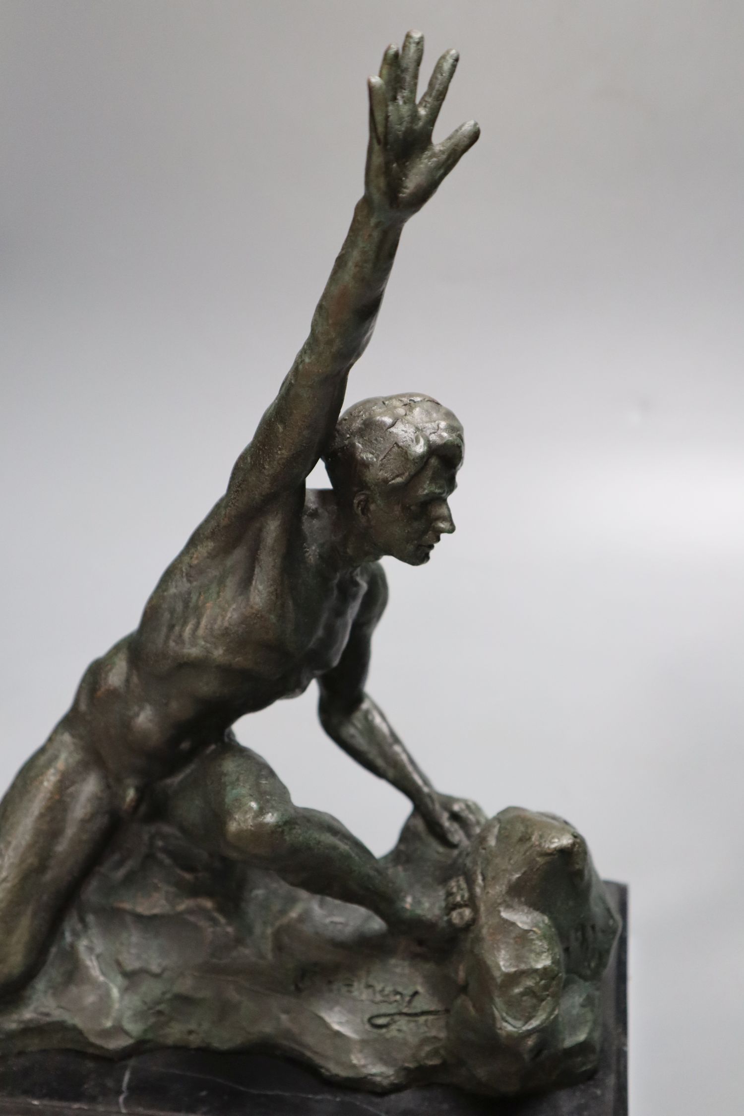 A bronze of a nude male, on marble base, indistinctly signed, height 36cm